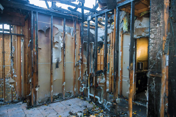 Professional Fire Damage Restoration technician working in Hager City, WI